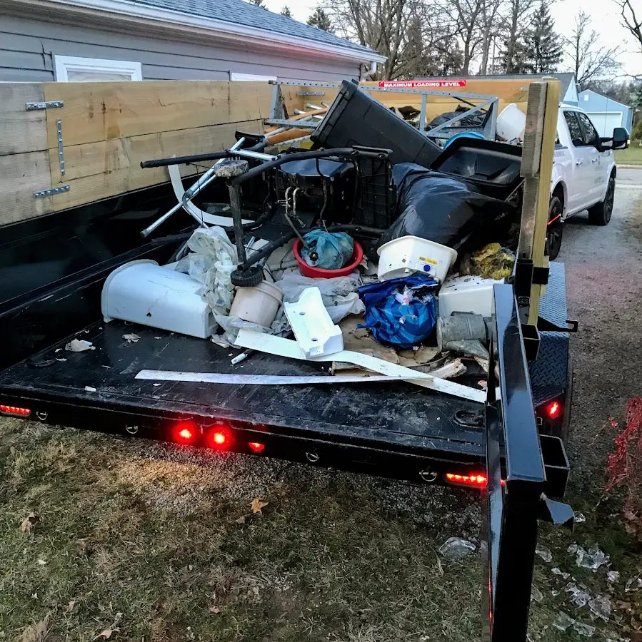 Roll-off dumpster delivered to a residential driveway in Malabar